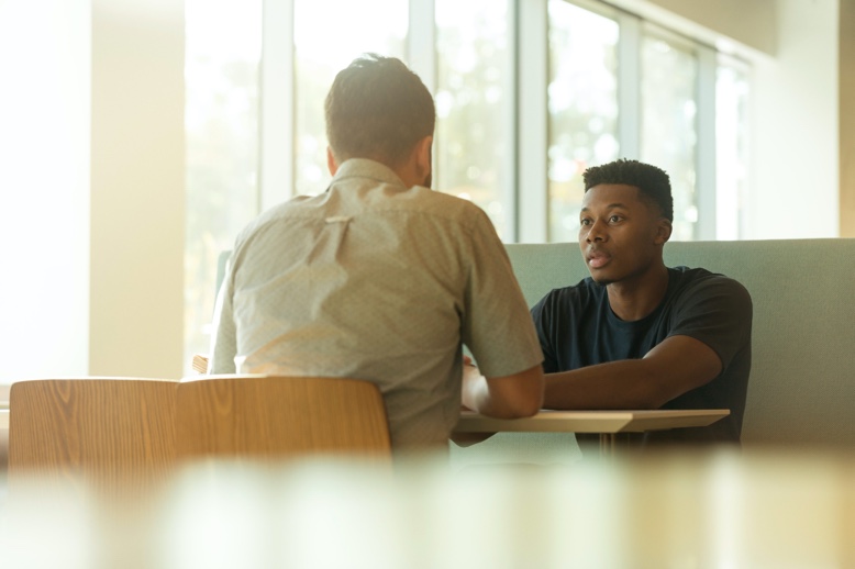 Two men having a discussion